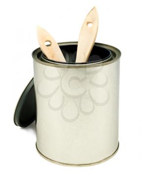 Two paintbrushes in a paint can isolated over white