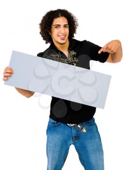 Latin American man showing an empty placard isolated over white