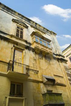 Low angle view of buildings in a city, Valletta, Malta