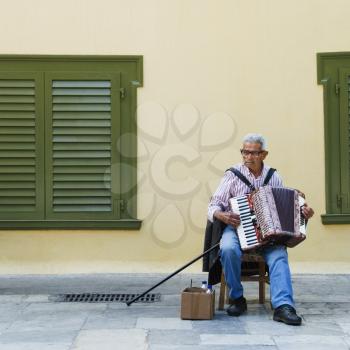 Man playing an accordion, Athens, Greece