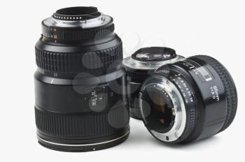 Close-up of three photographic lenses