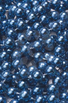 Close-up of string of blue beads