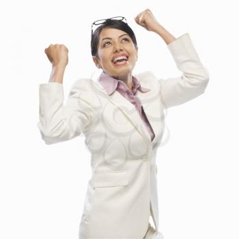 Businesswoman exclaiming with joy