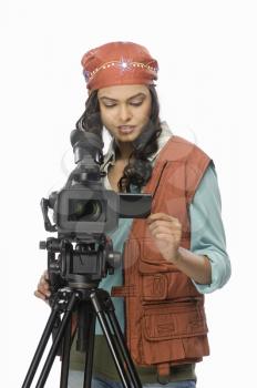 Female videographer videographing