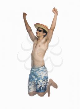 Man jumping against white background