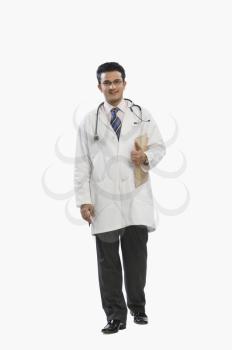 Portrait of a doctor holding a clipboard