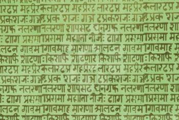 Close-up of text on sheet of handmade paper