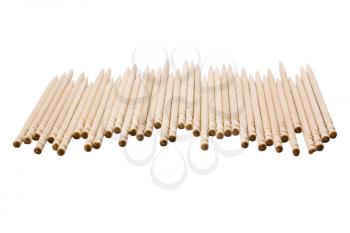 Close-up of toothpicks in a row