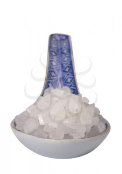 Close-up of a spoon full of crystal sugar