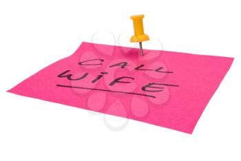 Text Call Wife written on an adhesive note