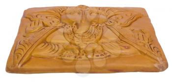 Lord Ganesha engraved on a wooden block