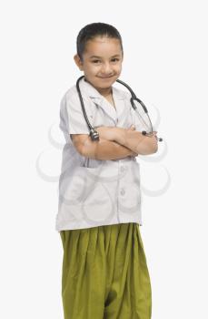 Girl dressed as a doctor and smiling