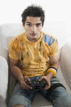 Portrait of a man playing a video game