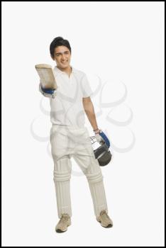 Portrait of a batsman celebrating his success