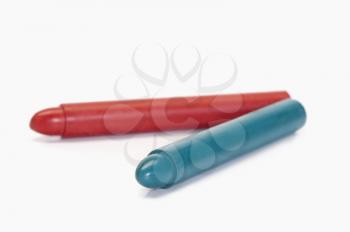 Close-up of red and blue crayons
