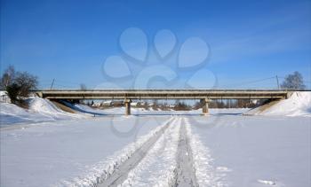 car bridge through freeze river