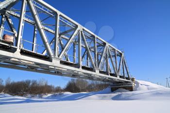 railway bridge through freeze river