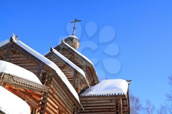wooden chapel on blue background