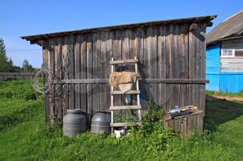 rural shed on green herb