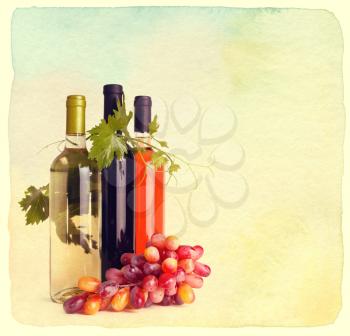 Bottles of wine and grapes. Vintage retro style. Paper textured.