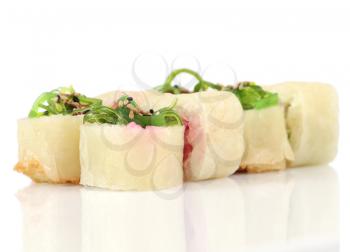 Sushi hot rolls with shrimp, cheese, tuna, wakame seaweed on white