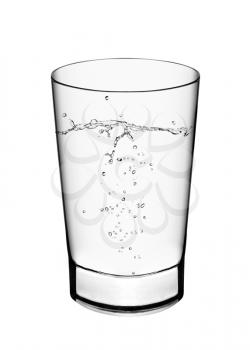 A glass of water and water splahes on white background 