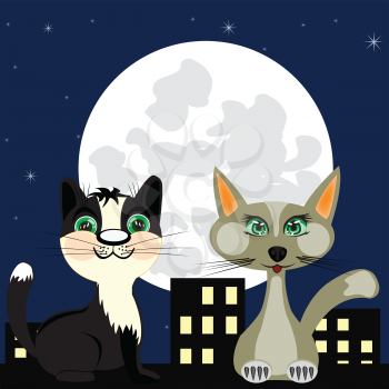 Two cats on roof of the building at moon in the night