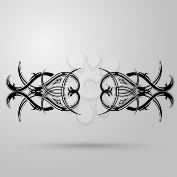 Tribal tattoo on a gray background with shadow