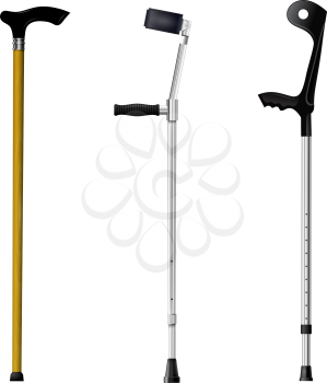 Set of orthopedic walking sticks on white background