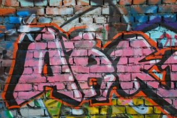 Graffiti on the brickwall as a background