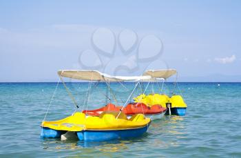Royalty Free Photo of Peddle Boats on the Ocean