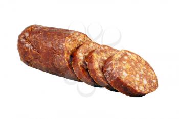 Sliced smoked sausage isolated on white background