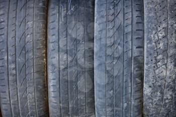 Old used and dirty tires, warehouse, close up