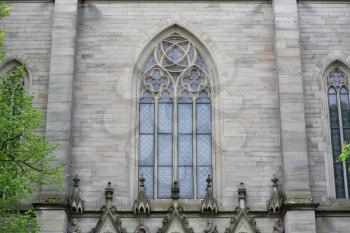 Beautiful, high and pointed window in the Evangelical Church in Germany.