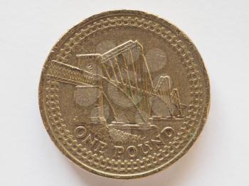 1 pound coin money (GBP), currency of United Kingdom, with Forth bridge in Edinburgh, Scotland