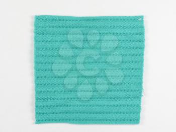 Green fabric swatch over white background