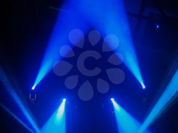 Blue spot lights at a concert