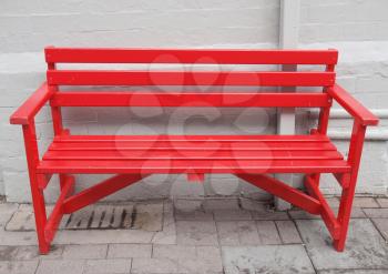 Red bench chair used in stations and public parks