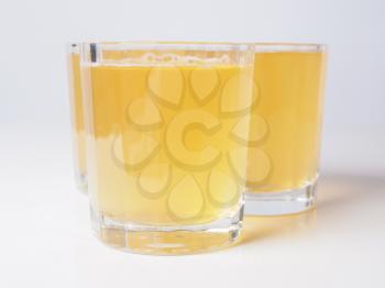 Glasses of pineapple juice on continental breakfast table
