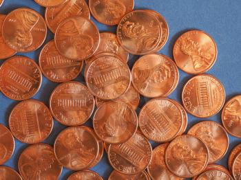 One Cent Dollar coins money (USD), currency of United States over blue background