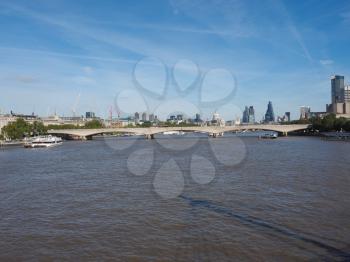 Waterloo Bridge over River Thames in London, UK seen from the Jubilee Bridge
