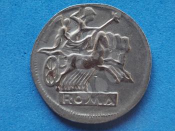 close macro detail of ancient roman coin with horses and biga (chariot)