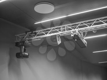 Stage lights and loudspeakers used in live gig concert in an auditorium