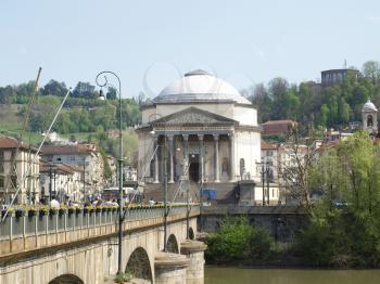 Busy bridge in Turin city centre, in front of Gran Madre church