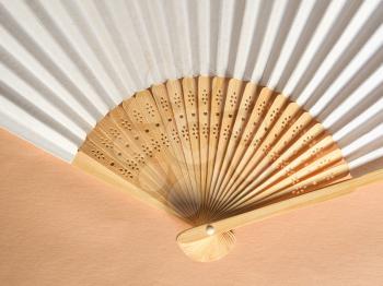 traditional Japanese foldable handheld fan (aka hand fan) made of bamboo wood and paper