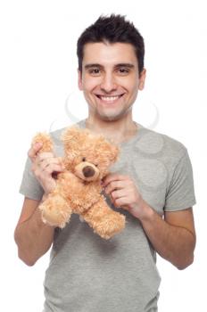 Royalty Free Photo of a Man Holding a Teddy Bear