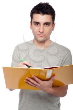 Royalty Free Photo of a Man Studying With a Dossier
