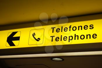 Royalty Free Photo of a Telephone Sign at an International Airport