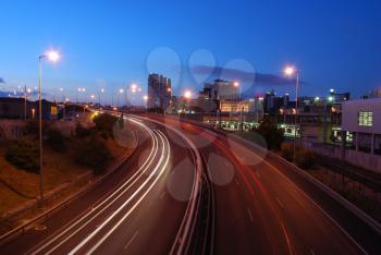 Royalty Free Photo of a Night Shot of Speeding Traffic on a Freeway