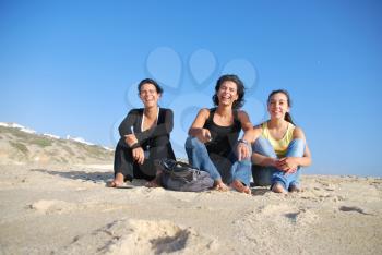 Royalty Free Photo of Sisters Smiling at the Beach